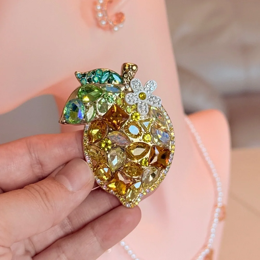 Elegant Gold and Green Crystal Brooch